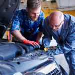 Mechanic busy in car remapping for better performance