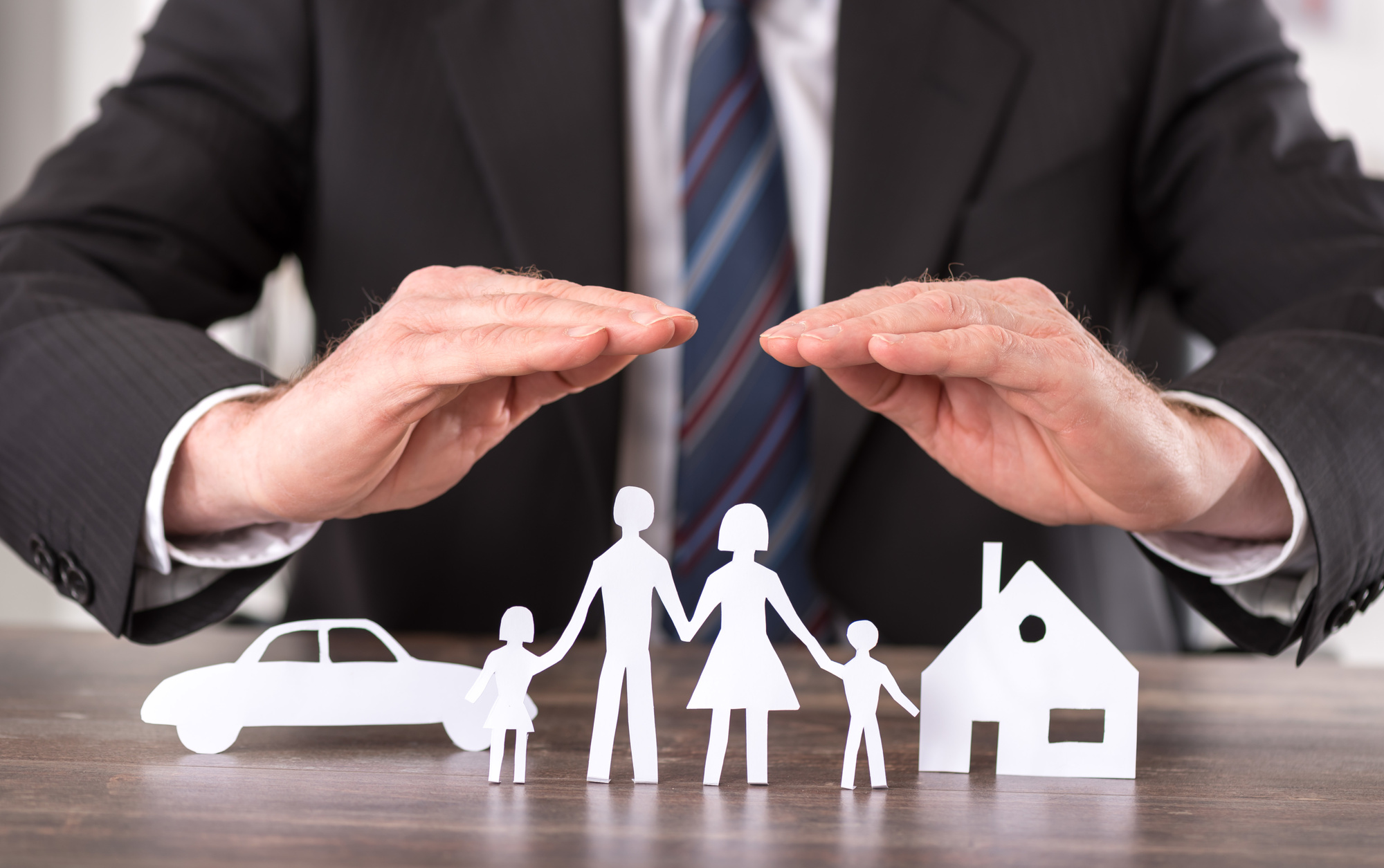 How does an adjuster differ from an insurance company representative?